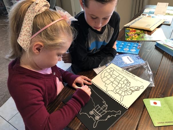 Kids playing with little passports