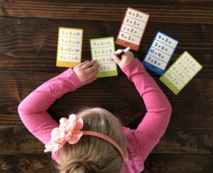 Girl playing a math flashcard game