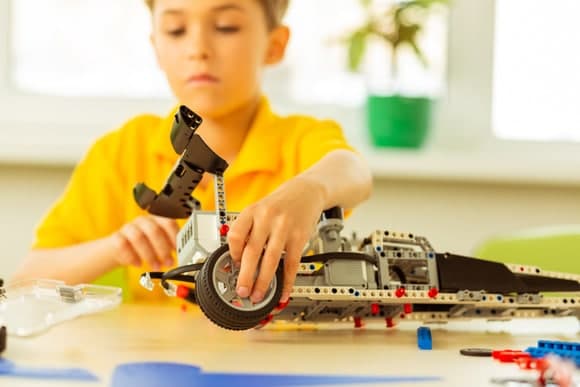 Boy playing with legos