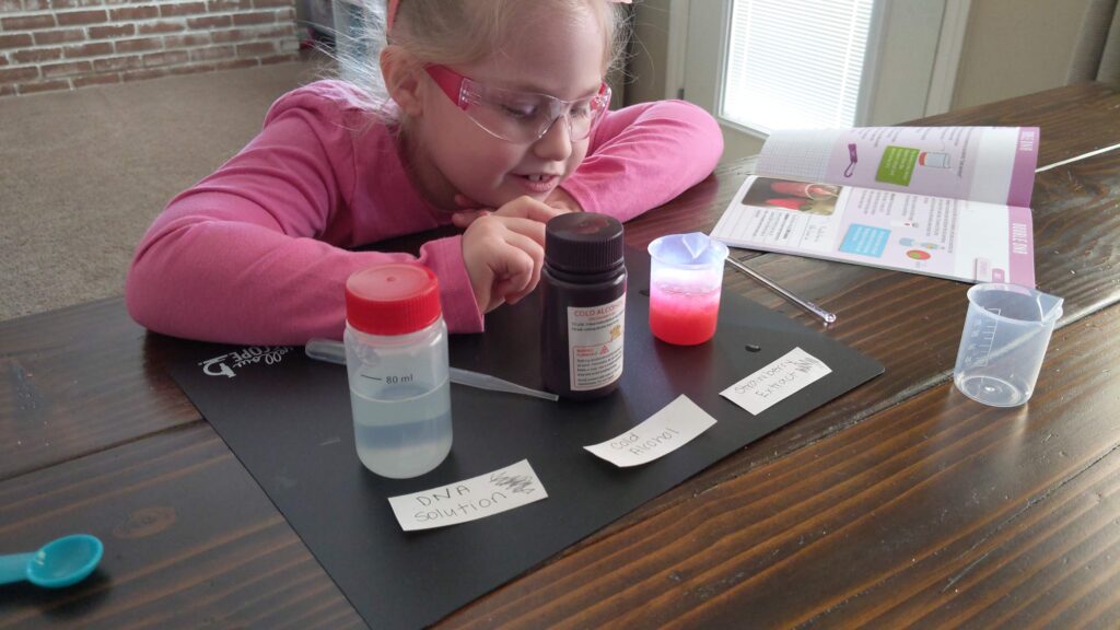 Girl performing chemistry test