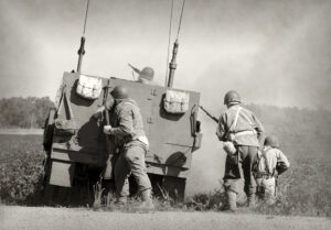 Soldiers in World War II era battle