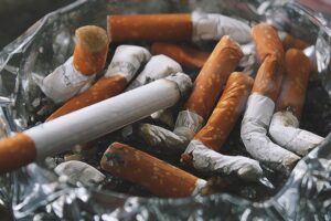 cigarettes in ashtray.