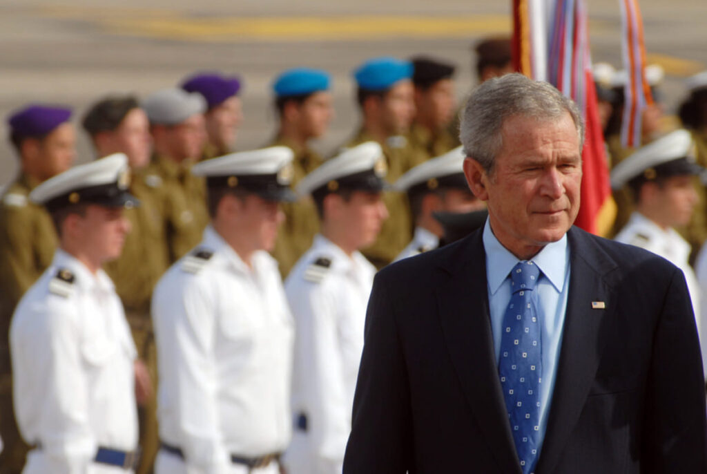 george walker bush in welcoming ceremony in israel.