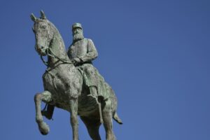 statue of king leopold II riding a horse.