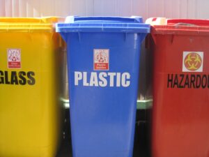 glass, plastic, and hazard trash bins.