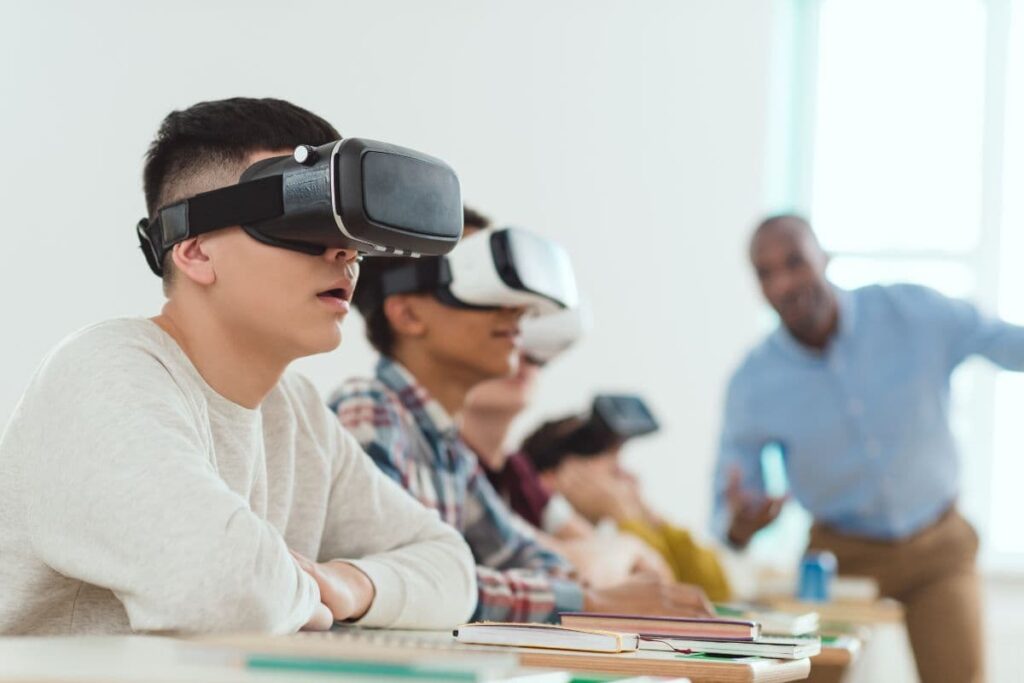 student using virtual reality AR at school with a talking teacher.